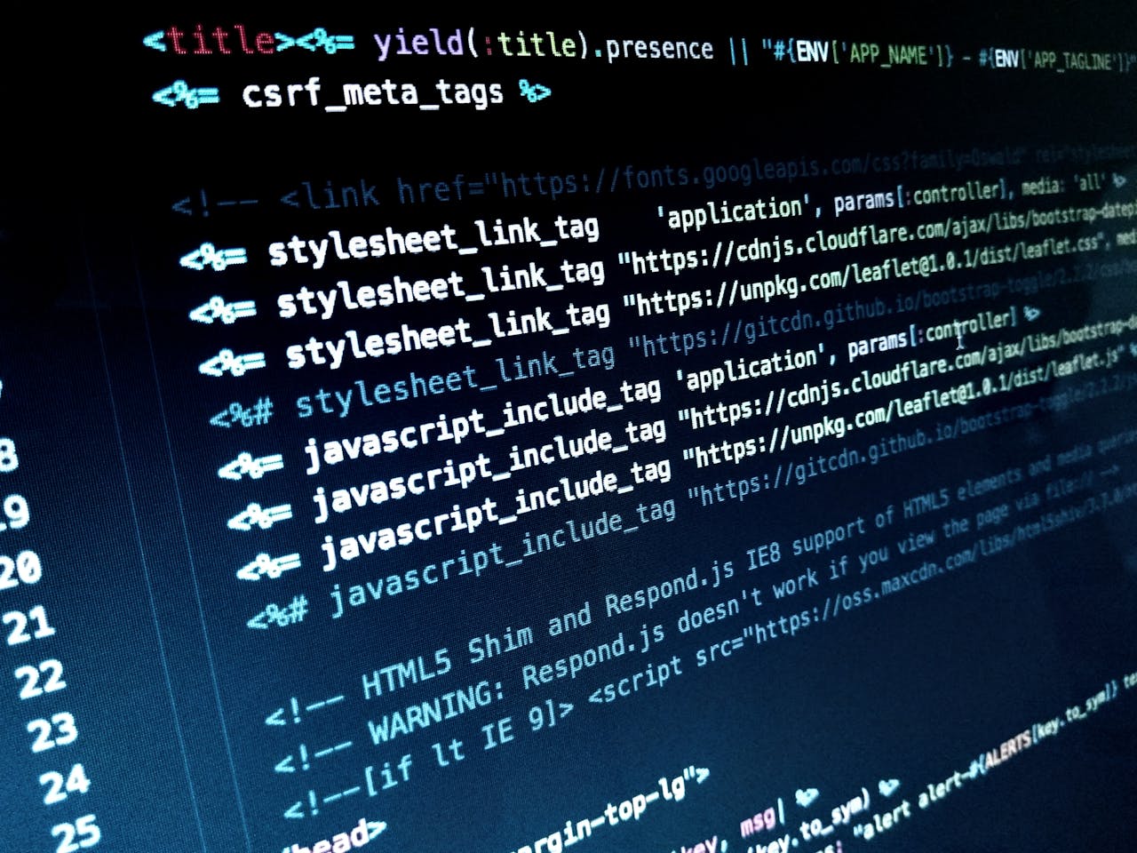 ours-journey Detailed view of HTML and JavaScript code displayed on a computer monitor.